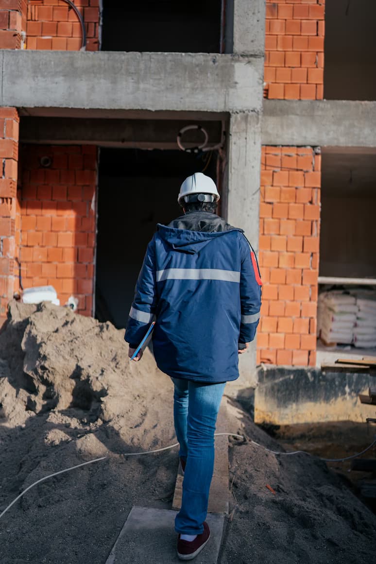 A general contractor reviewing project plans
